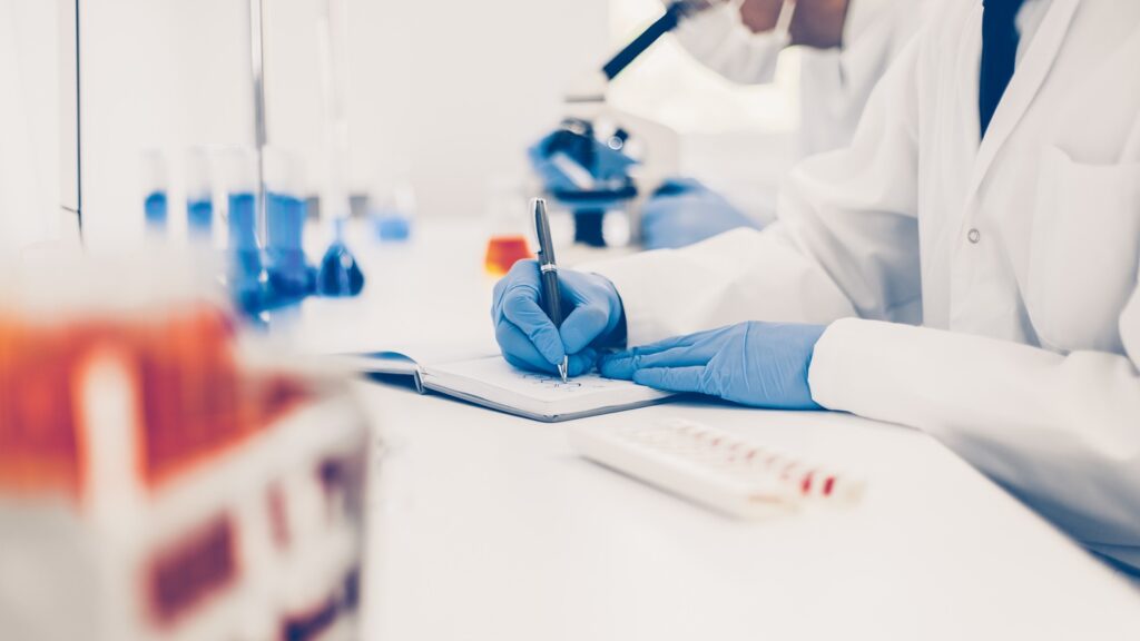 Close,Up.,Scientist,Recording,The,Results,Of,The,Study,In