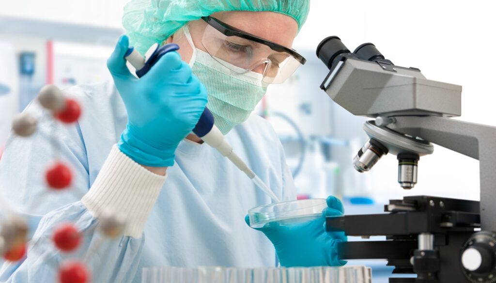 Scientist,With,Dropper,Working,At,The,Laboratory