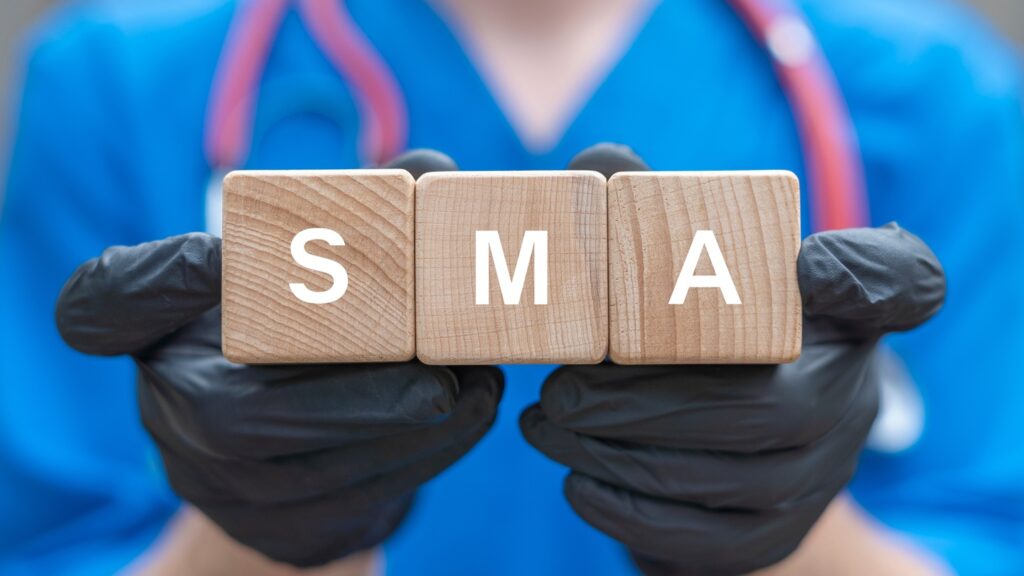 Physician,Holding,Wooden,Cubes,With,Acronym:,Sma.,Genetic,Disease,Sma