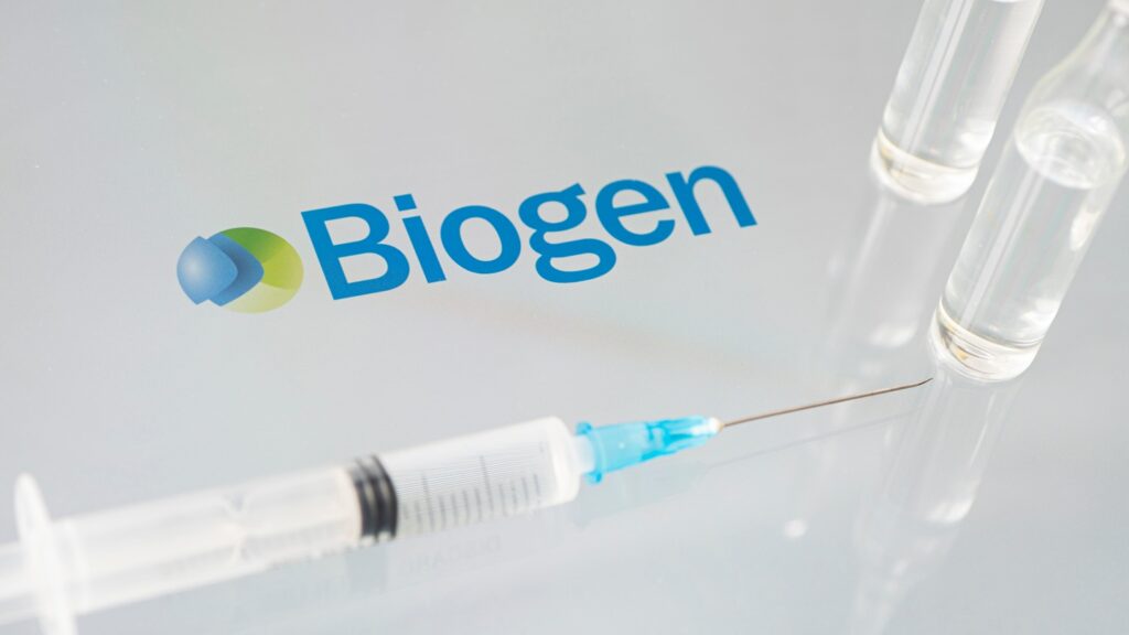 Vials,Of,Liquid,On,A,White,Table,And,The,Logo