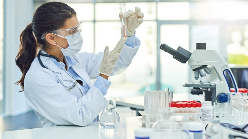 Woman,,Scientist,And,Test,Tube,With,Thinking,At,Laboratory,,Assessment